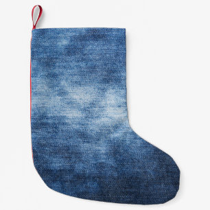 Abgetragener Denim-Stoff, texturierter Hintergrund Kleiner Weihnachtsstrumpf