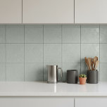 Abstract Plaster Brush Texture Sage ID1287 Fliese<br><div class="desc">This ceramic tile features an abstract texture inspired by sweeping brush strokes and hand-troweled plaster finishes. The elegant neutral, medium dusty sage color enhances the tile’s contemporary appeal while remaining highly versatile for a variety of interior styles including modern, industrial, minimalist, and Japandi-inspired spaces. Perfect for backsplashes, fireplace surrounds, feature...</div>