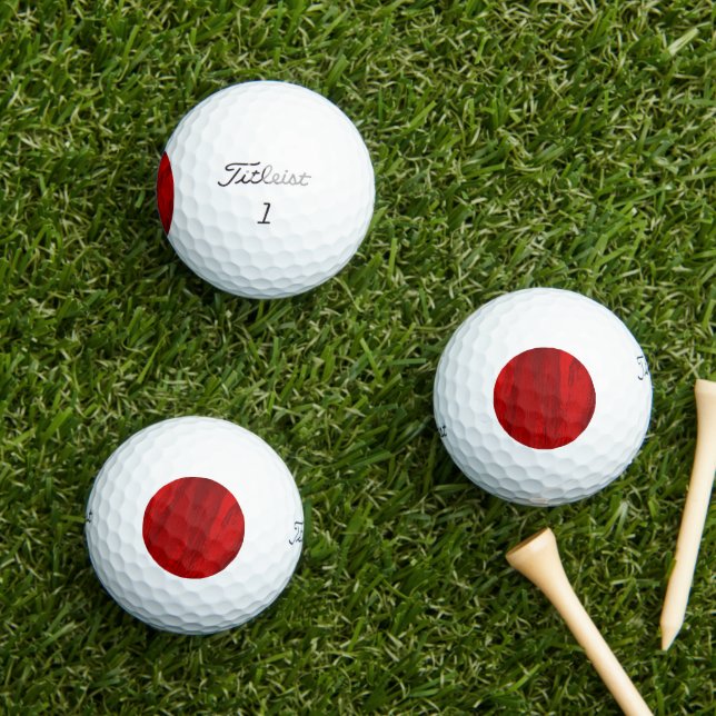 Abstrakte Diagonalfarben in roter Ausführung Golfball (Insitu Gras)