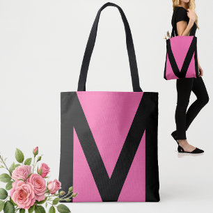 Abstrakte geometrische Form in Schwarz und Neonpin Tasche
