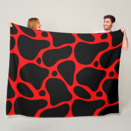 Abstrakte Giraffenmuster in Rot und Schwarz Fleecedecke