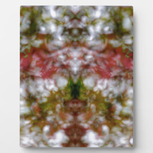 Abstrakte Kaleidoskopfigur und Gesichter Fotoplatte