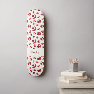 Abstrakte Kreise und Monde in Rot plus Name Skateboard
