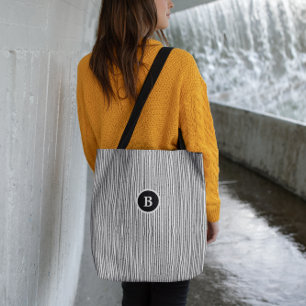 Abstrakte Linien in Schwarz und Weiß Tasche