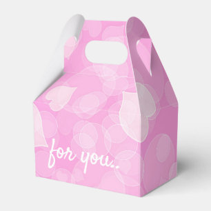 Abstrakte rosa Bokeh Herzen Geschenkschachtel