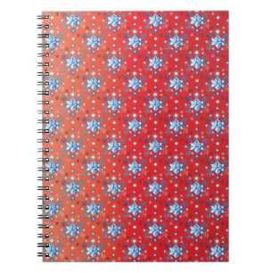 Abstrakte Schneeflocken in Rot und Blau Notizblock