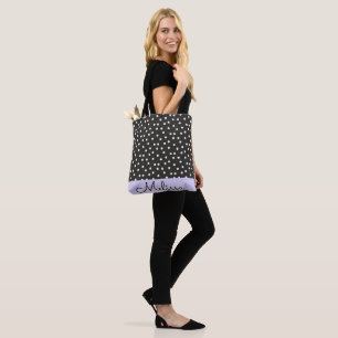 Abstrakte weiße Polka-Punkte auf dem violetten Str Tasche