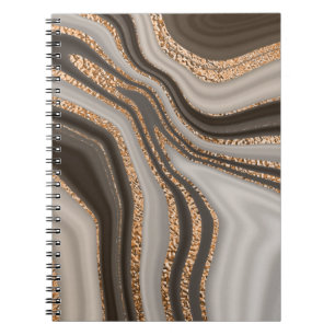 Abstrakter brauner Marmor mit goldener Textur Notizblock
