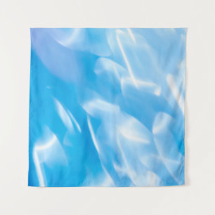 Abstrakter Glitzer leuchtet auf blauem Hintergrund Wandteppich
