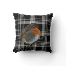 Abstrakter Rotkehlvogel auf schwarzem Tartan