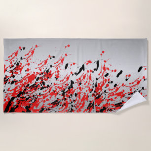 Abstrakter Splash und Tropfen in Schwarz und Rot Strandtuch
