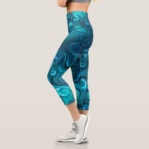 Abstraktes blaues und Aquamarines Spiralmuster Capri Leggings