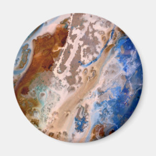 Abstraktes Sandstrandmuster mit Schaumwasser Magnet