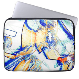 Abtropfte Tinte, Bild mit orangefarbenem und blaue Laptopschutzhülle