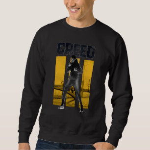 Adonis Creed Pose mit III Gelb Sweatshirt