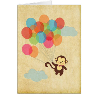 Adorable singe s'enfuit avec des ballons