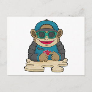 Affe beim Poker mit Poker Karten und Sonnenbrille