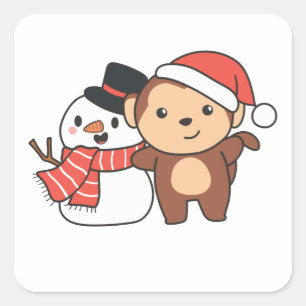 Affe mit Schneemann im Winter zu Weihnachten Quadratischer Aufkleber