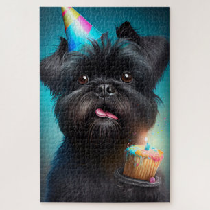 Affenpinscher feiert Geburtstagskuchen