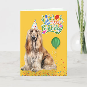 Afghan Hound Hund in einem Partyhut auf gelben Geb Karte