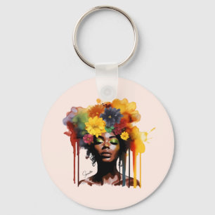 Afrikanisch-amerikanische Frau mit geblümtem Afro- Schlüsselanhänger