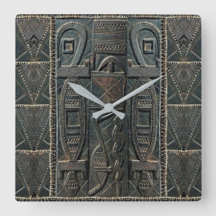 Afrikanische schnitzende Uhr