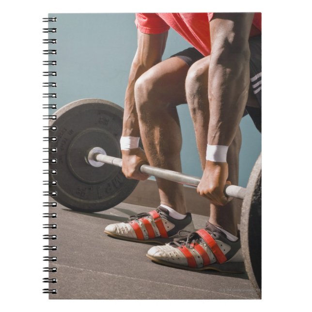 Afrikanischer Amerikaner, der den Fitnessraum trai Notizblock (Vorderseite)