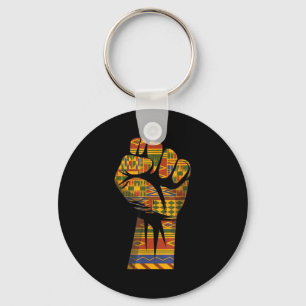 Afrikanisches Kente-Muster erhobene Faust schwarze Schlüsselanhänger