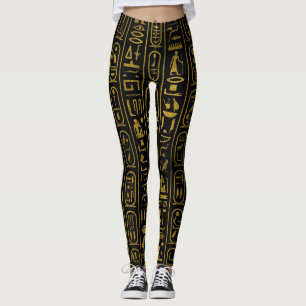 Ägyptische alte Goldhieroglyphen auf Schwarzem Leggings