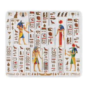 Ägyptische Hieroglyphen und Gottheiten aus Gold au Schneidebrett