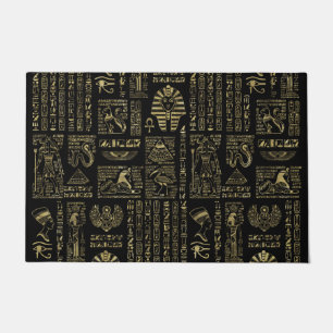 Ägyptische Hieroglyphen und Gottheitsgold auf Fußmatte
