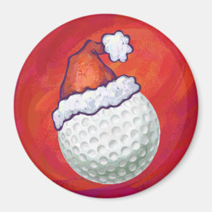 Aimant Balle de golf avec chapeau de Père Noël sur fond r