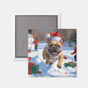 Aimant Bouledogue français courant dans la neige avec un 