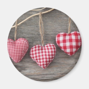 Aimant Coeurs rouges sur le Tableau en bois