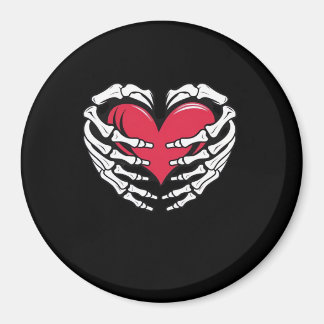 Aimant Ed Heart Dans Les Mains Squelettiques Classique