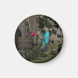 Aimant Fée mignonne nourrissant un oiseau