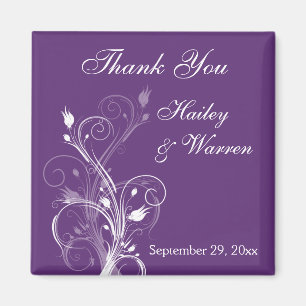 Aimant floral pourpre et blanc de faveur de