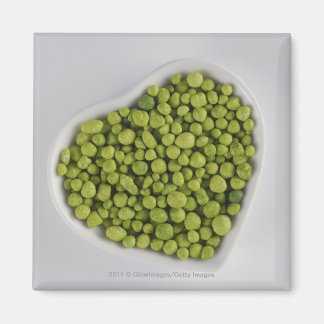 Aimant Gros plan de galets verts dans un bol en forme de 