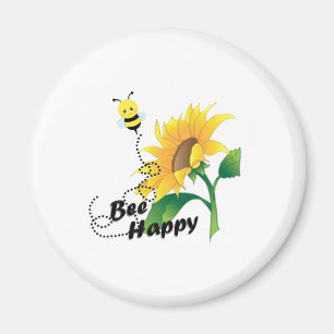 Aimant heureux d'abeille avec le tournesol
