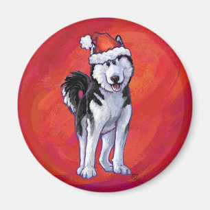 Aimant Husky à Santa Hat Sur Rouge