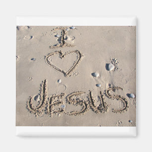 Aimant J'aime Jésus écrit en sable
