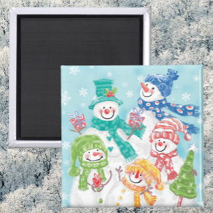 Aimant Jolie famille des neigeurs de Noël dans la neige