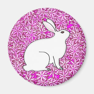 Aimant Lapin sur un lit de fleurs de printemps