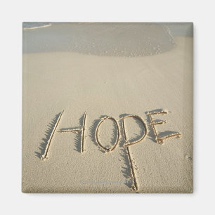 Aimant Le mot "Hope" sur la plage