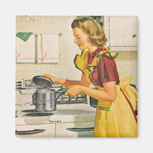 Aimant les années 1940 faisant cuire la femme au foyer
