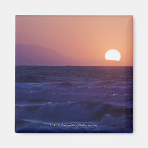 Aimant Lever de soleil au-dessus de la baie de Malaga