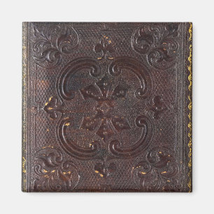 Aimant Livre en cuir ancien déchu
