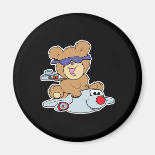 Aimant ours en peluche de vacances dans l'avion