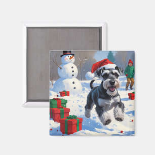 Aimant Schnauzer courant dans la neige avec un chapeau de