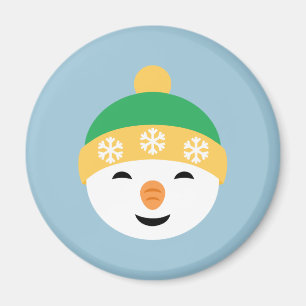 Aimant Snowman de Noël en Casquette vert sur bleu clair